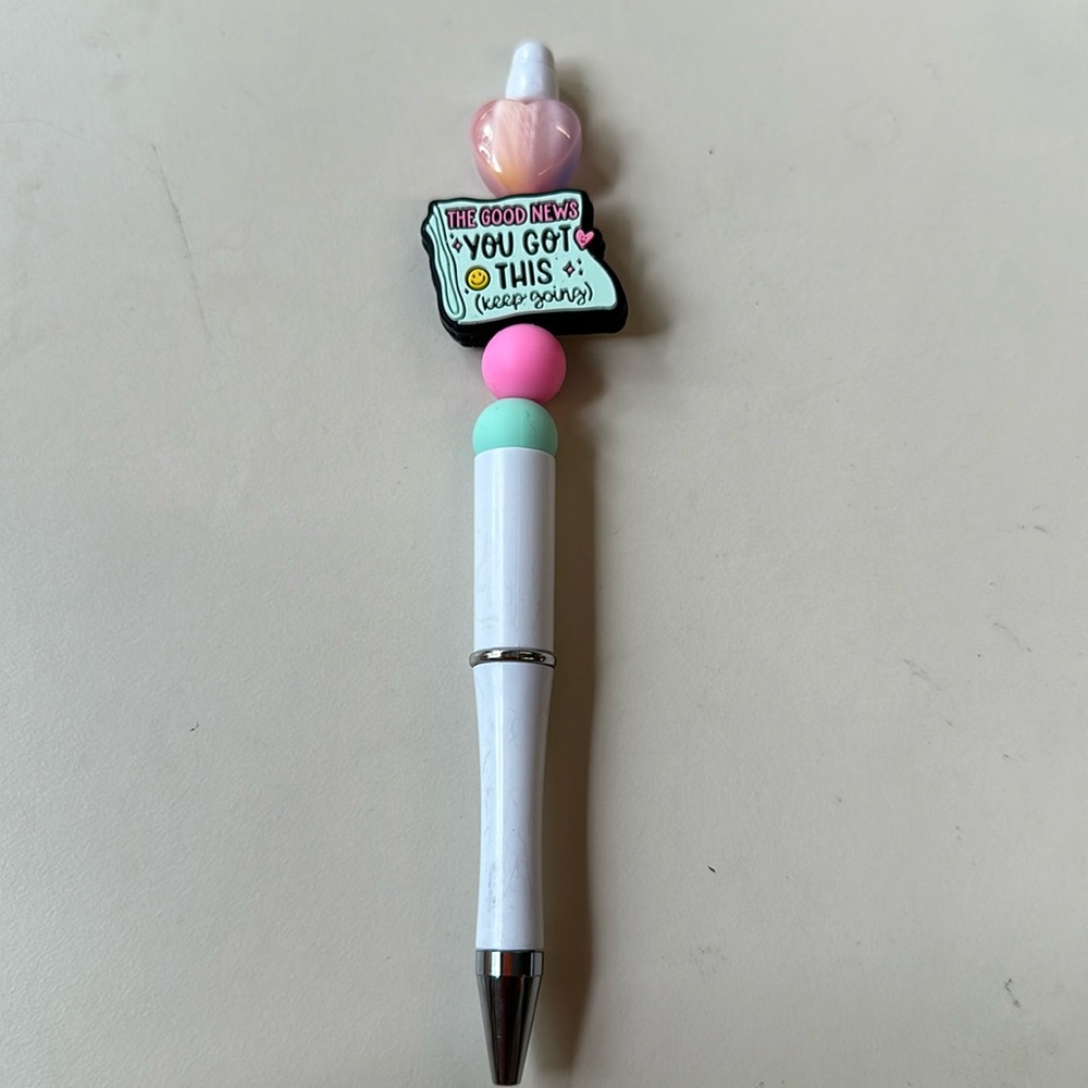 Beaded pen with black ink and refill: The good news: you got this (keep going)